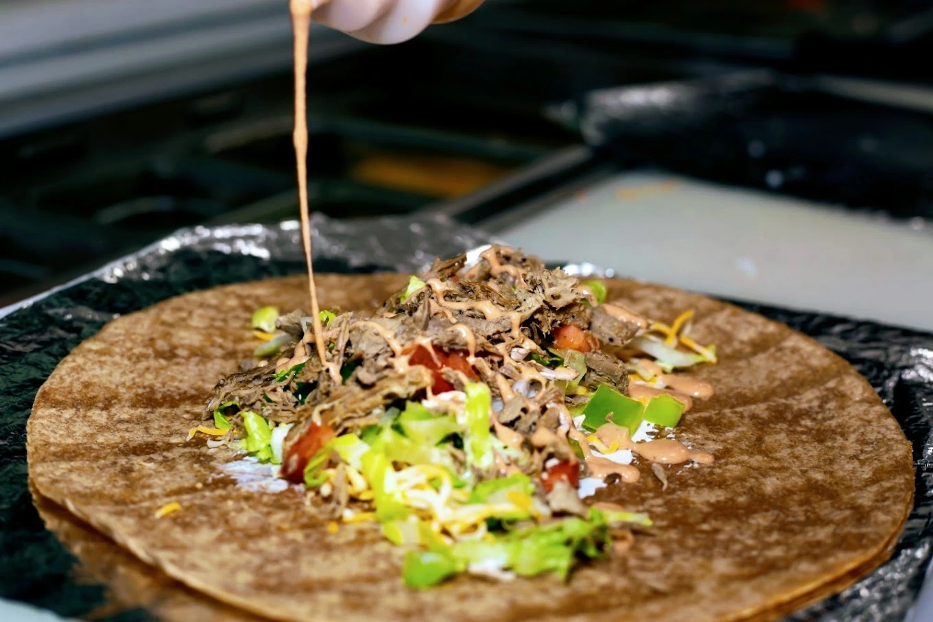 Delicious BBQ Ranch Steak Grilled Wrap at Hungry Birds in Edmonton, AB